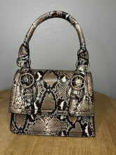 Load image into Gallery viewer, The Cobra Clutch (Brown)