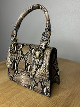 Load image into Gallery viewer, The Cobra Clutch (Brown)