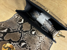 Load image into Gallery viewer, The Cobra Clutch (Brown)
