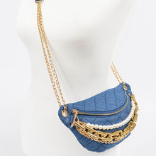 Load image into Gallery viewer, The clutch's standout design is accentuated by its layered multi-chain detailing, which adds a touch of modern elegance Dimensions:10"W x 5"H x 2.5"D Materials:Denim, Mixed Metal