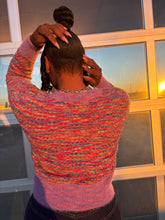 Load image into Gallery viewer, Vivid Sunset Palette: A captivating gradient of pink, lavender, turquoise, red, yellow, and blue, inspired by the beauty of twilight skies.
Button-Up Sweater: Perfectly oversized for layering, featuring front buttons for an adjustable, effortlessly cool look.
Halter Top: A sleek, fitted design that adds a playful yet elegant touch to the set.
Versatile Styling: Wear together for a coordinated look or mix and match with other wardrobe favorites.

📏 Available Sizes: XS, S, M, L
