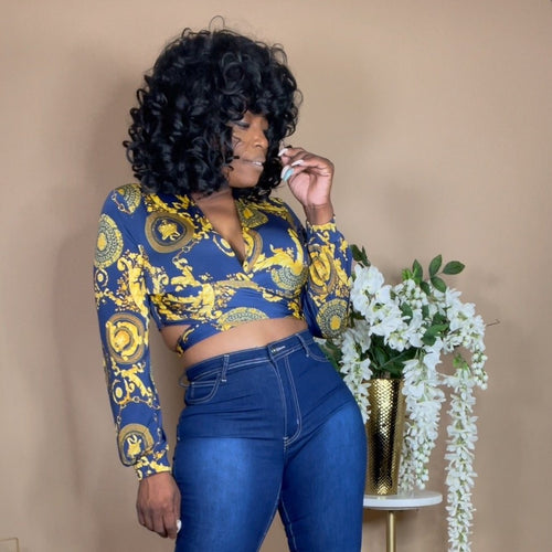 Multi-print Blue & Gold Baddie Crop Top styled for a night out with skirt and heels.